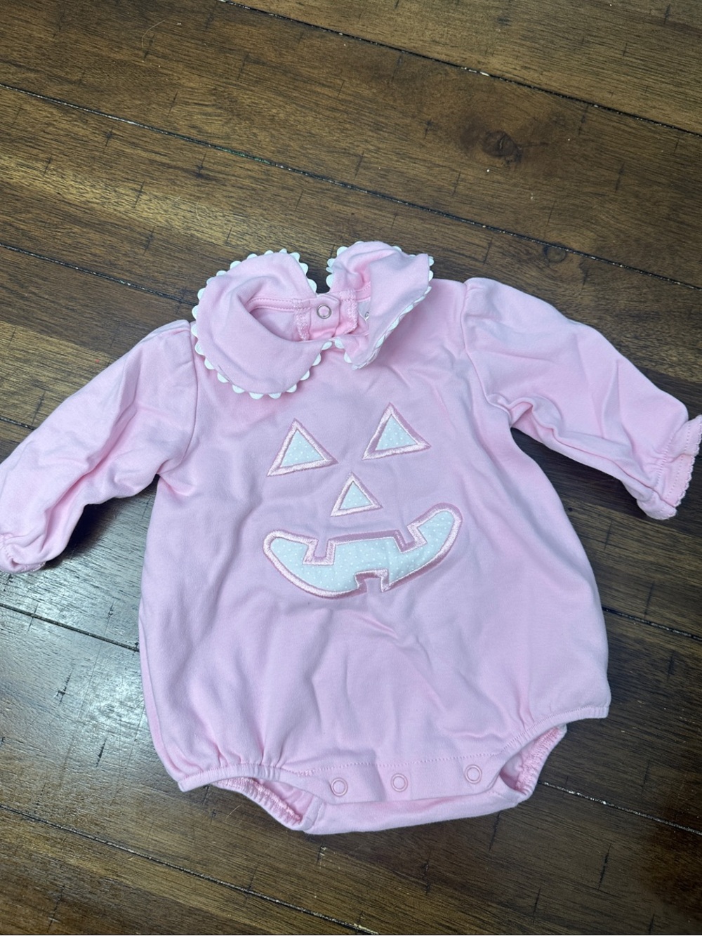 Southern Proper Pink Pumpkin Face Baby One-Piece Bodysuit